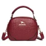Stylish round croc curve designer bag