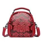 Flower embossed round pattern handbag