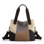 Wide strap splicing canvas shoulder bag