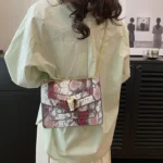 Snakeskin embossed square chain bag - Image 11