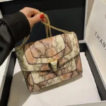 Snakeskin embossed square chain bag - Image 12