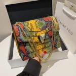 Snakeskin embossed square chain bag - Image 13