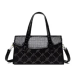 Elegant crocodile embossed bright leather handbag