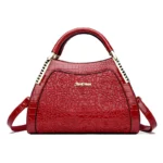 Embossed pattern round designer handbag