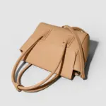 Structured khaki satchel back and side detail