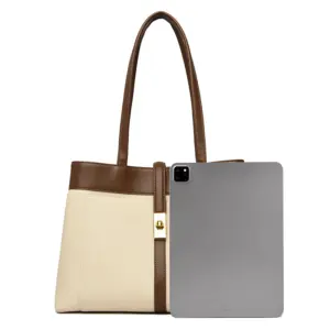 Large canvas work tote shown with tablet