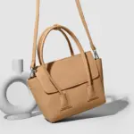 Khaki pocket satchel worn crossbody