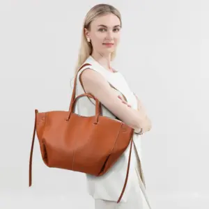 Coffee brown soft wing tote styled on model