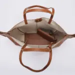 Soft wing tote open interior and zip compartments