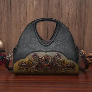 Floral Embossed Half-Moon Handbag in black