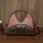 Floral Embossed Half-Moon Handbag in brown