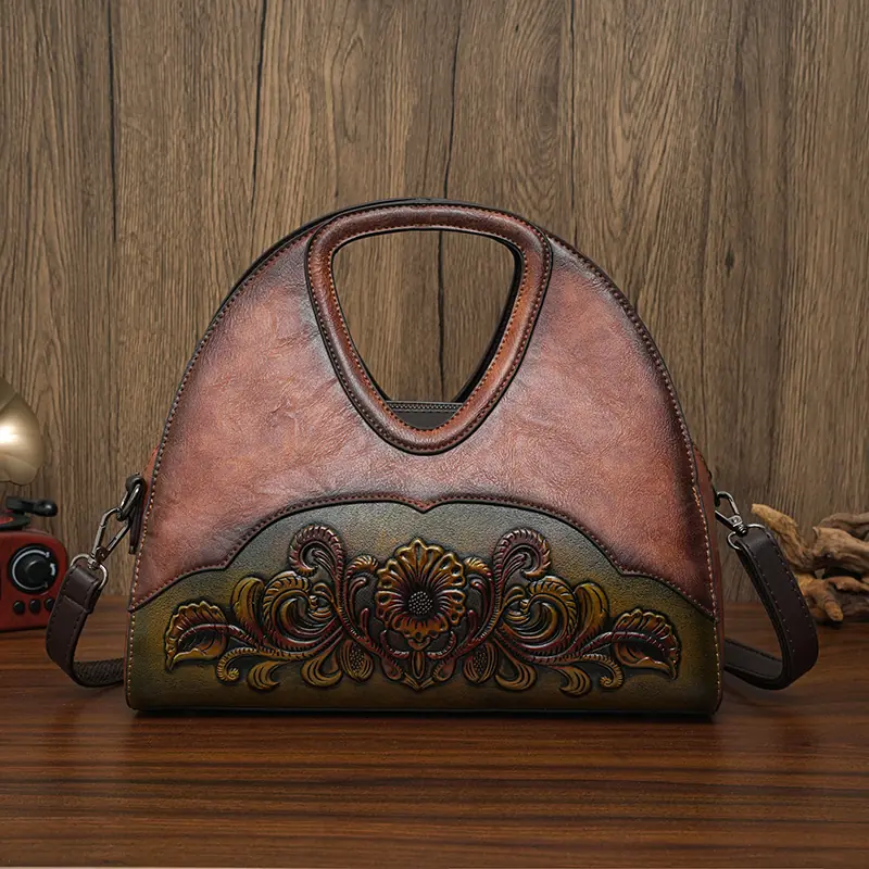 Floral Embossed Half-Moon Handbag in brown