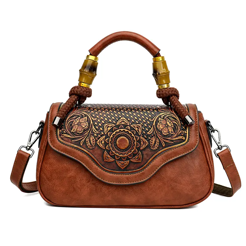 Carved floral bamboo-handle BAGYOHO satchel in brown